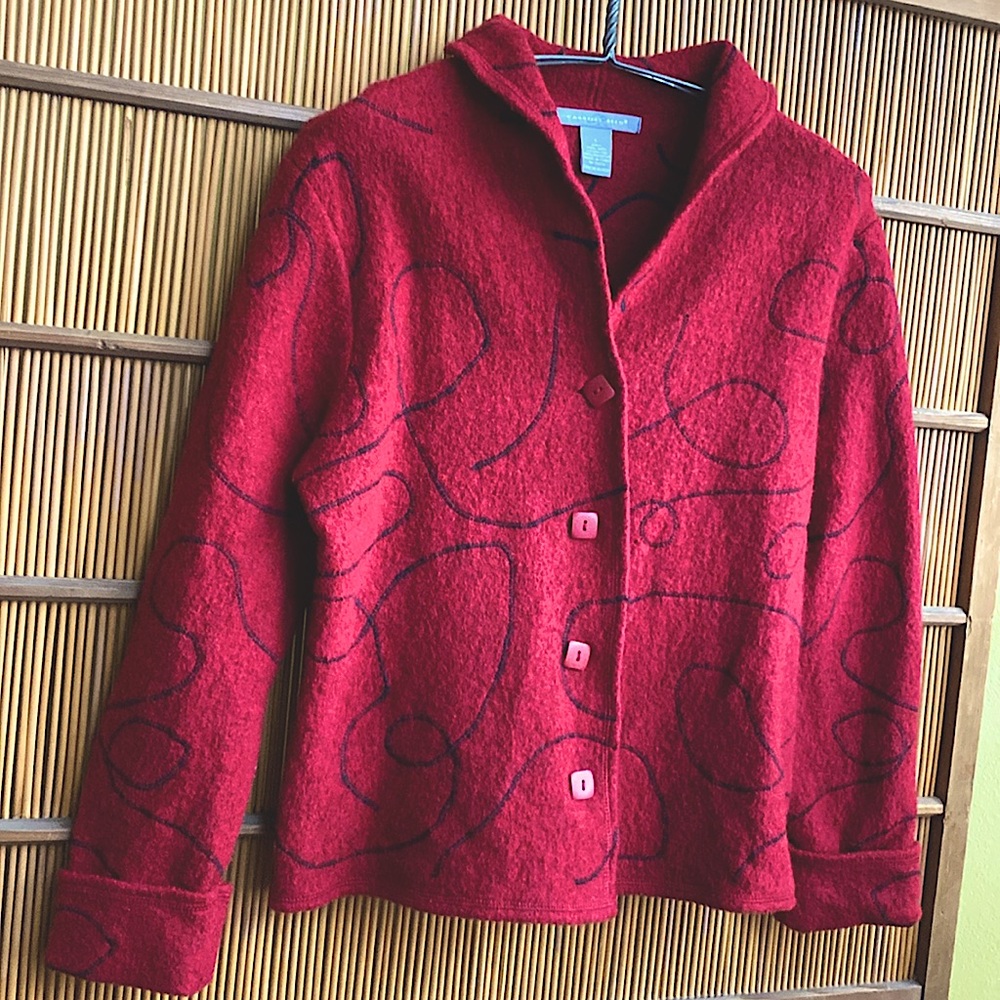Red boiled wool jacket with black meander embroidery